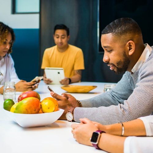 group-of-people-sitting-beside-table-2422295